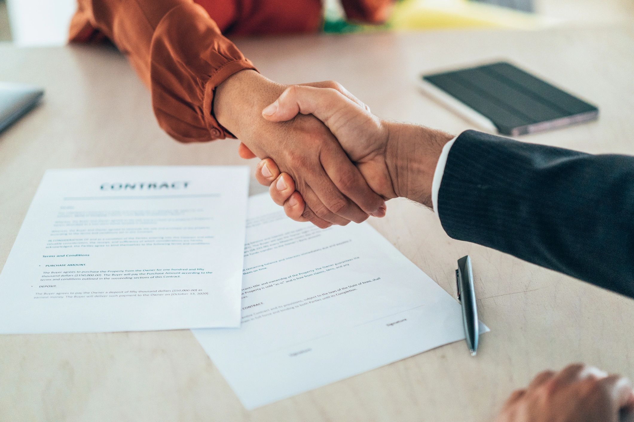 real estate business handshake deal